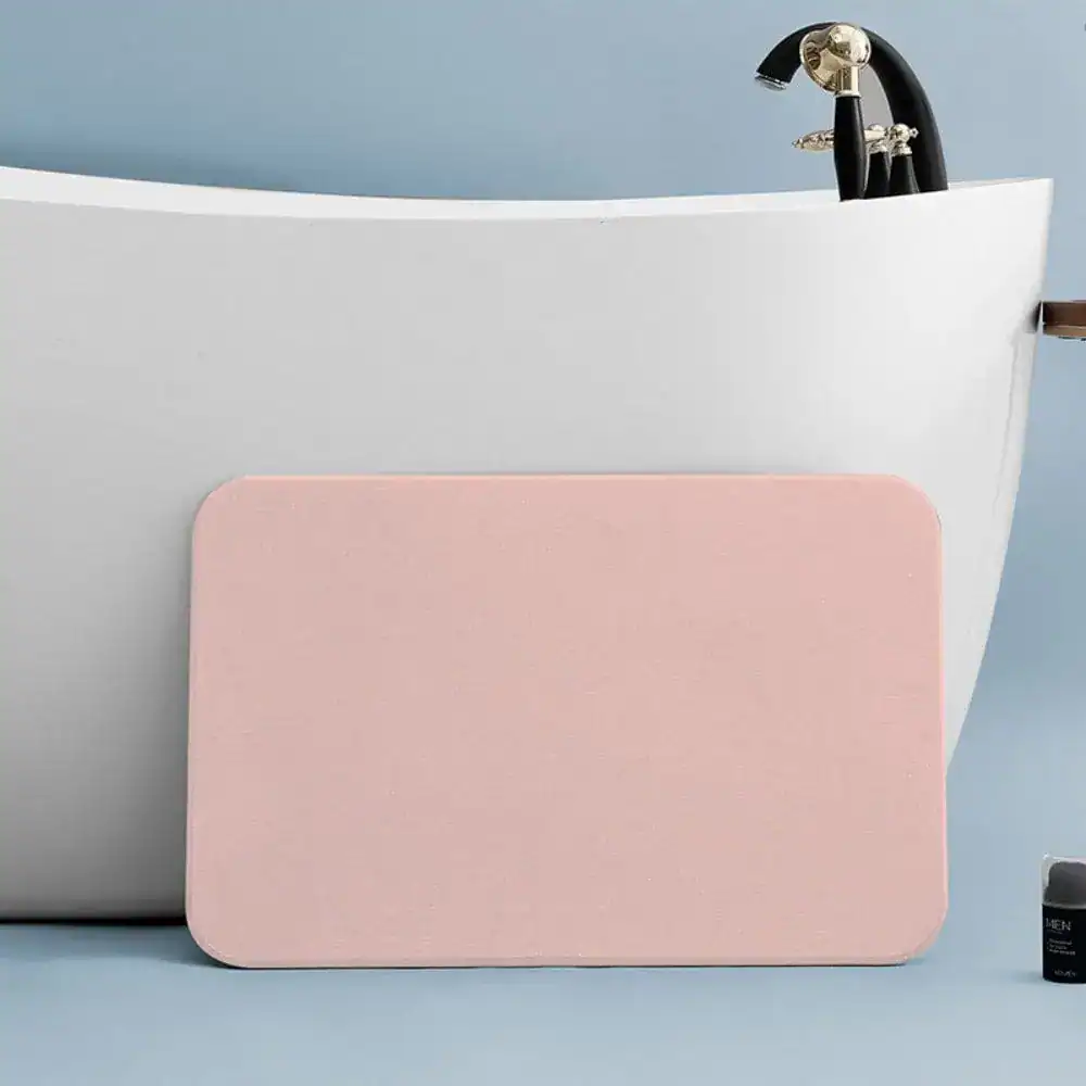 Rosé badkamermat voor de douche, antislip en absorberend.