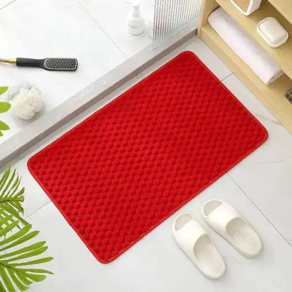 Rode antislip badmat groot voor badkamer met textuur.
