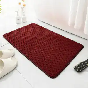 Rode antislip badmat groot voor de badkamer met textuur.