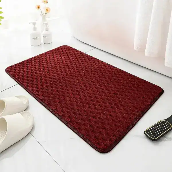 Rode antislip badmat groot voor de badkamer met textuur.