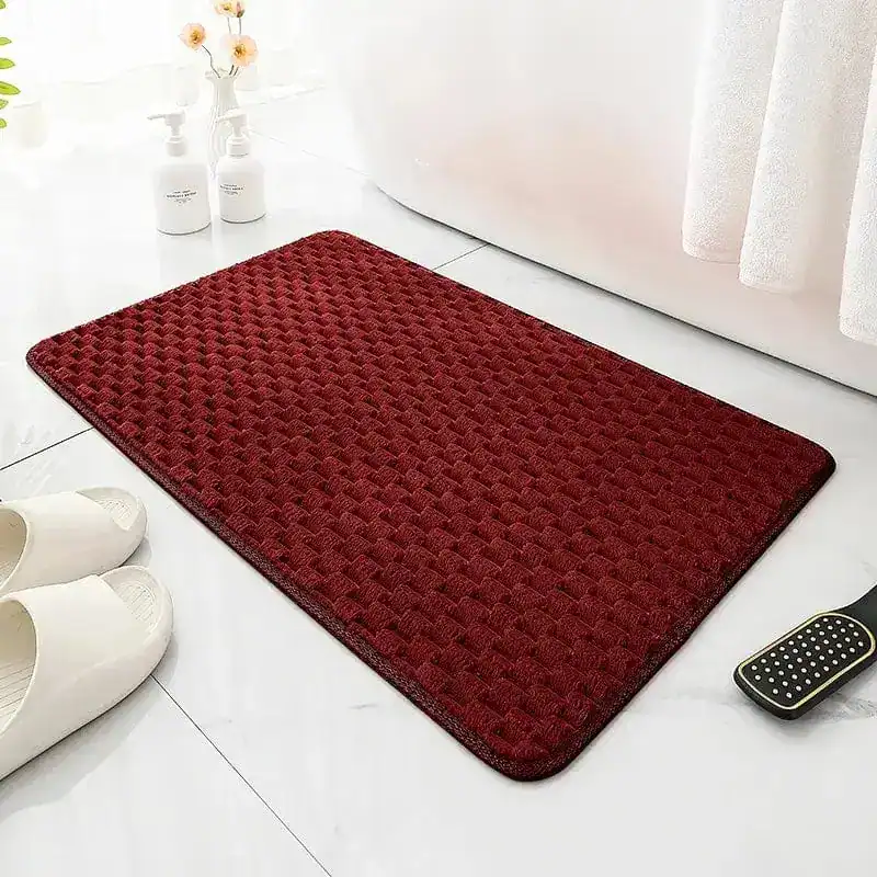 Rode antislip badmat groot voor de badkamer met textuur.