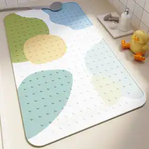 Antislip badmat babybad met kleurrijke vormen en textuur voor veiligheid.