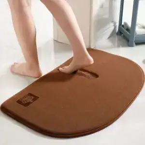 Ronde badkamermat bruin met antislipoppervlak voor comfort in de douche.