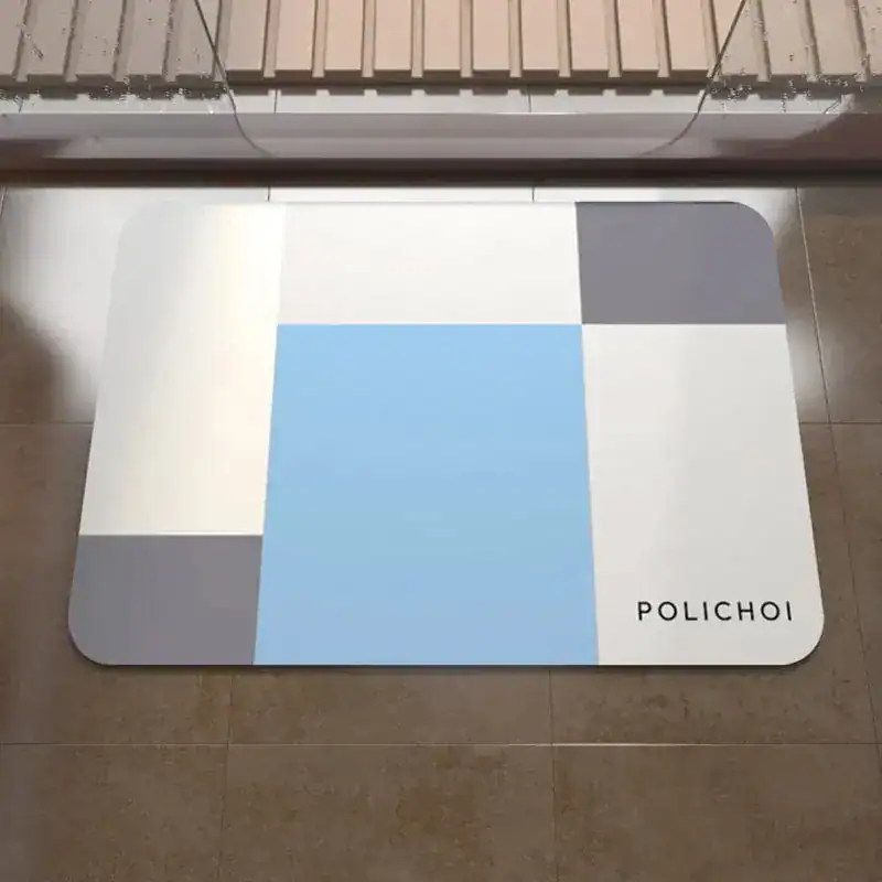 Badmat 40x60 met geometrisch patroon in blauw, wit en grijs, antislip badkamermat.