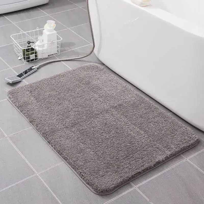 Grijze badmat 80x100 voor badkamer, antislip en comfortabel.