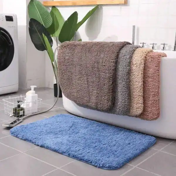 Blauwe badmat 80x100 voor badkamer, zacht en antislip.