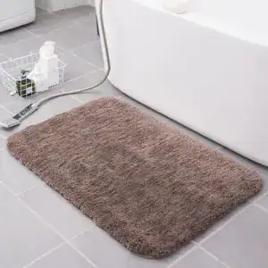 Bruine badmat 80x100 voor badkamer met zachte textuur en antislip eigenschappen.