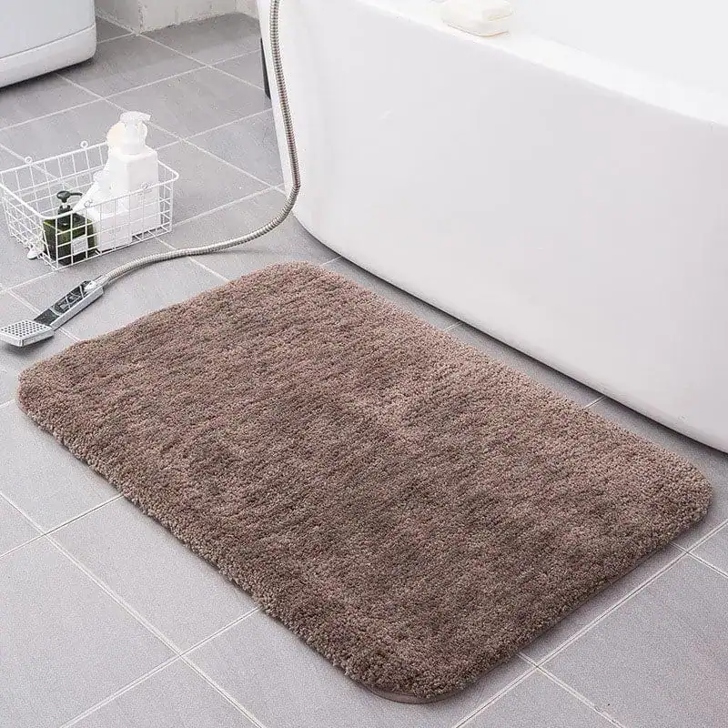 Bruine badmat 80x100 voor badkamer met zachte textuur en antislip eigenschappen.