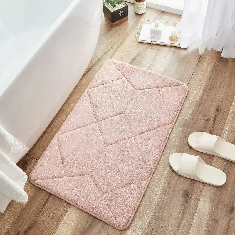 Beige badmat met antislip structuur, voor badkamer of douche.