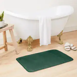 Donkergroene badmat met antislip onderzijde voor badkamer.