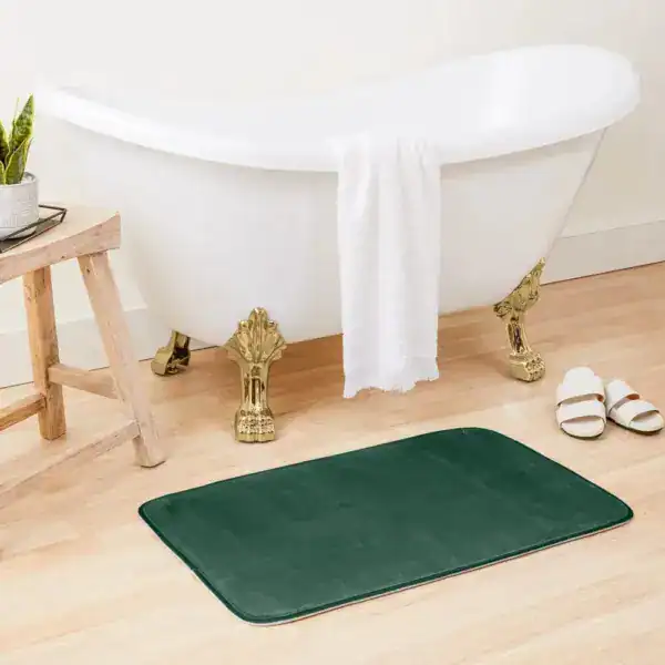 Donkergroene badmat met antislip onderzijde voor badkamer.