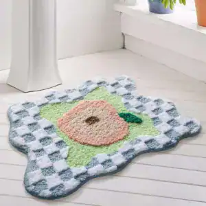 Badmat ecru met bloemmotief en antislipoppervlak voor badkamer.