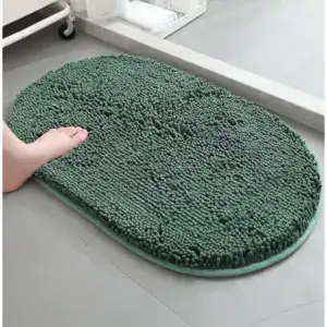 Groene ronde badmat met antislip rand, voor badkamer of douche.