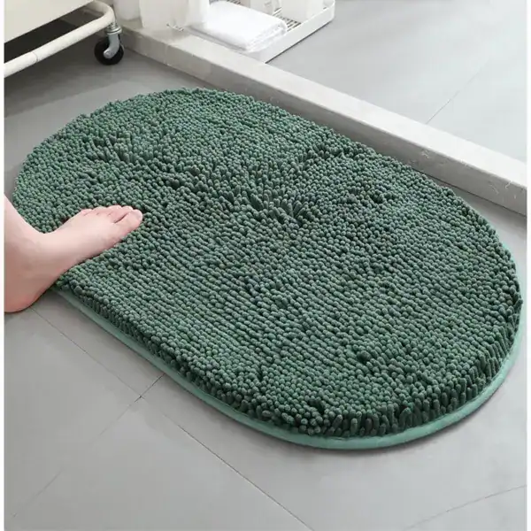 Groene ronde badmat met antislip rand, voor badkamer of douche.