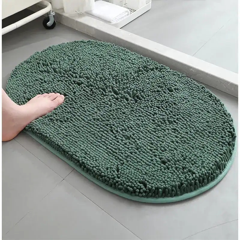 Groene ronde badmat met antislip rand, voor badkamer of douche.