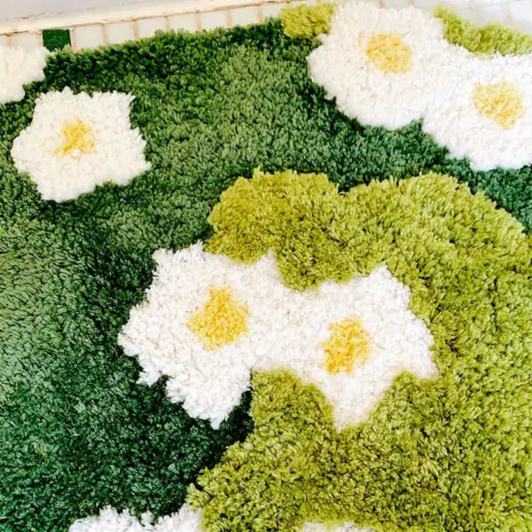 Badmat jade groen met witte bloemen en gele middelpunt, antislip badkamermat.