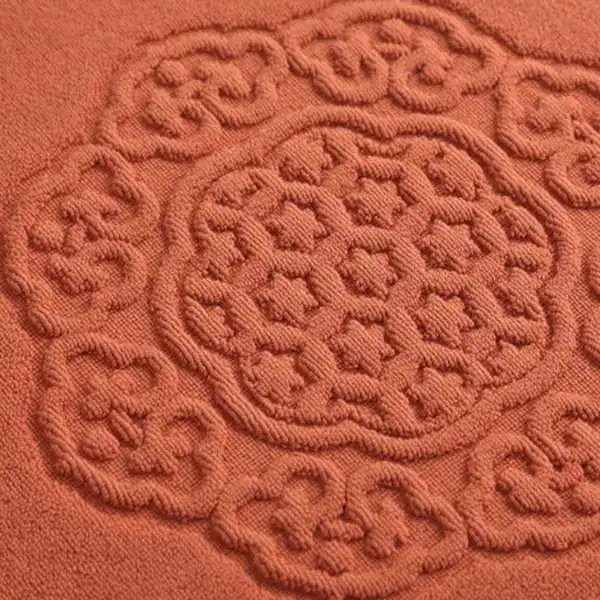 Badmat katoen antislip met bloemmotief in terracotta kleur.