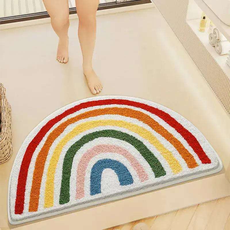 Regenboogvormige badmat met kleurrijke strepen, antislip voor badkamer.