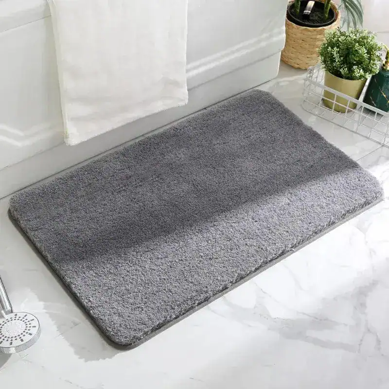 Grijze badmat met antislip onderkant voor badkamer.