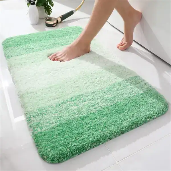 Mintgroene badmat met zachte textuur voor uw badkamer.