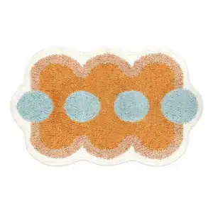 Multicolor badmat met blauwe en oranje cirkels, antislip badkamermat.