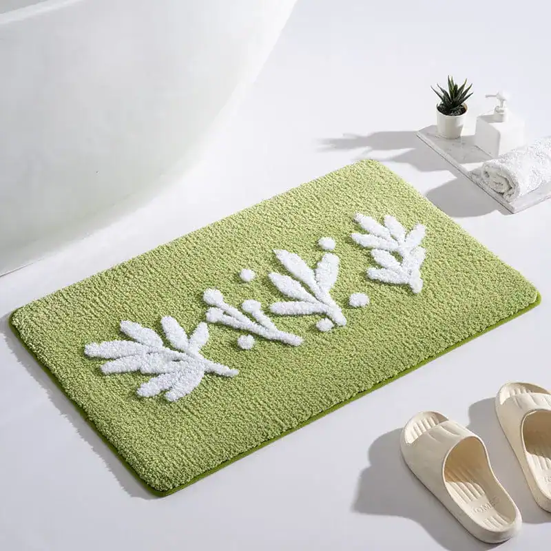 Olijfgroene badmat met witte bladmotief, antislip voor badkamer.