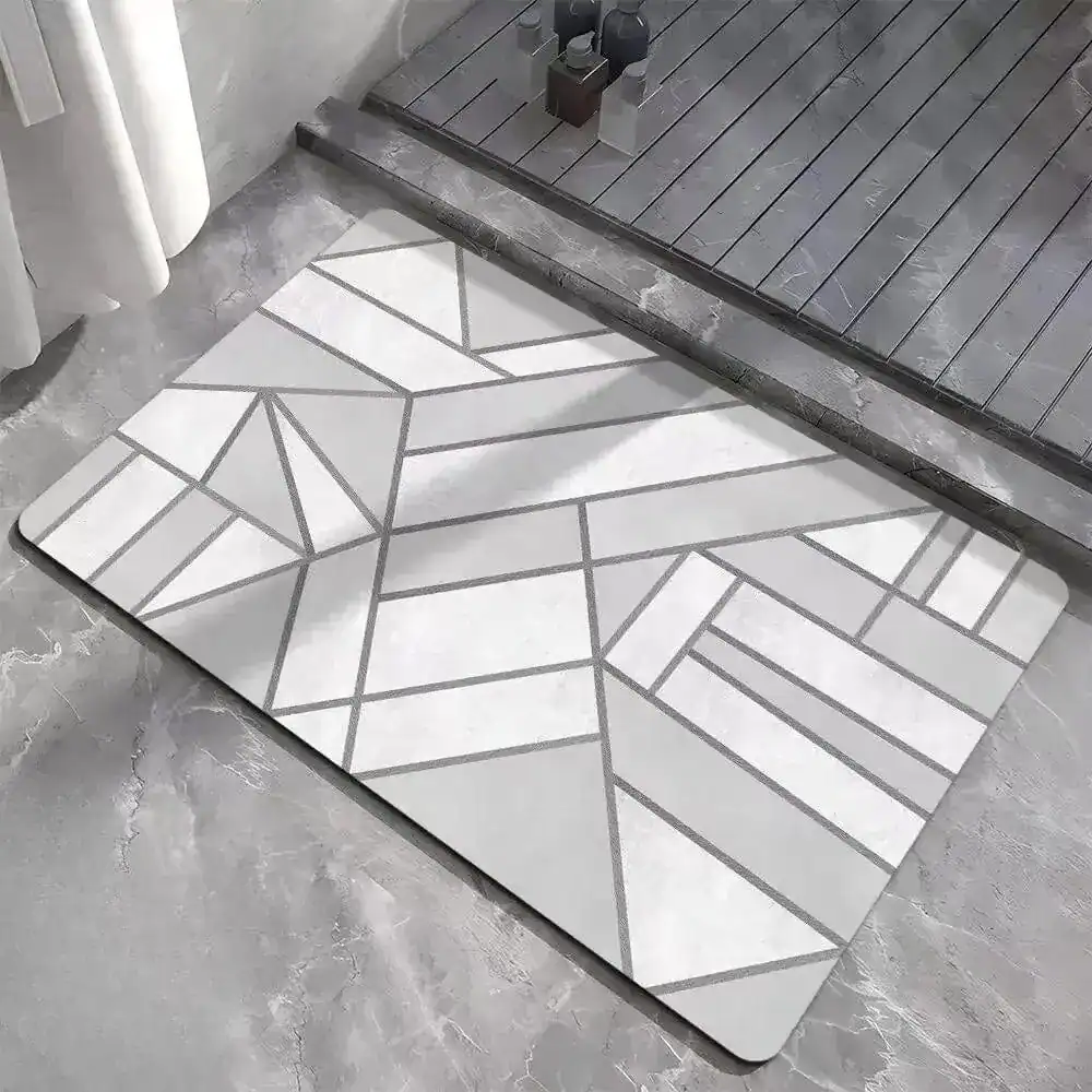 Grijze badmat met geometrisch patroon voor badkamer.