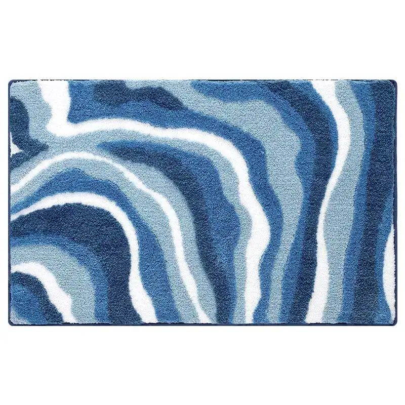 Badmat petrol blauw met zebra-achtige strepenpatroon, antislip badkamermat.