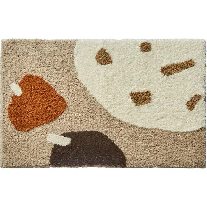Badmat roestbruin met abstracte vormen in beige, bruin en wit, antislip badkamermat.