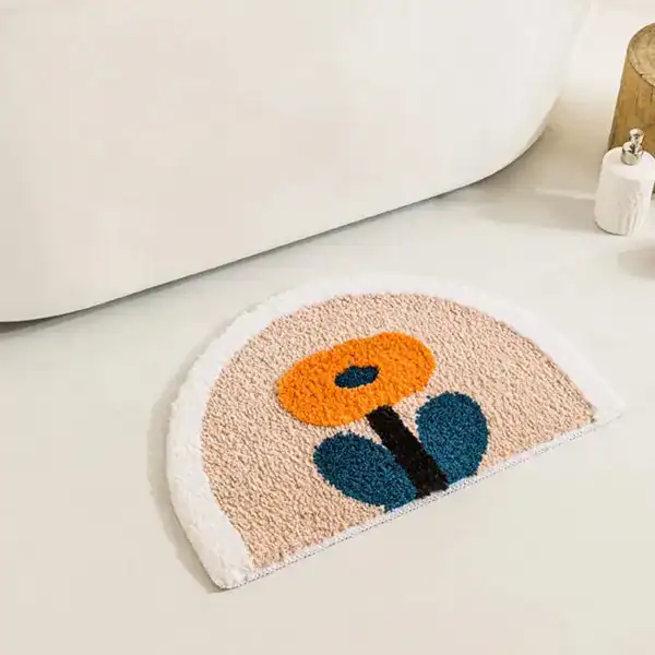 Ronde badmat wit met kleurrijke bloemmotief, antislip voor badkamer.