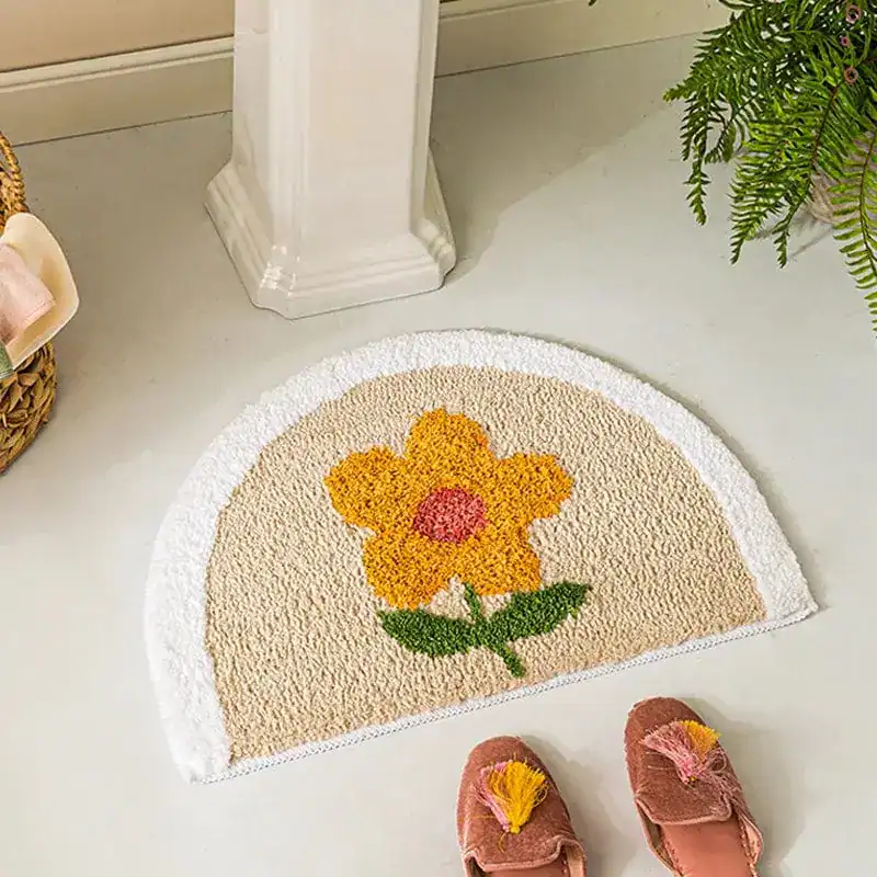 Ronde badmat wit met gele bloem, antislip badkamermat voor douche en bad.