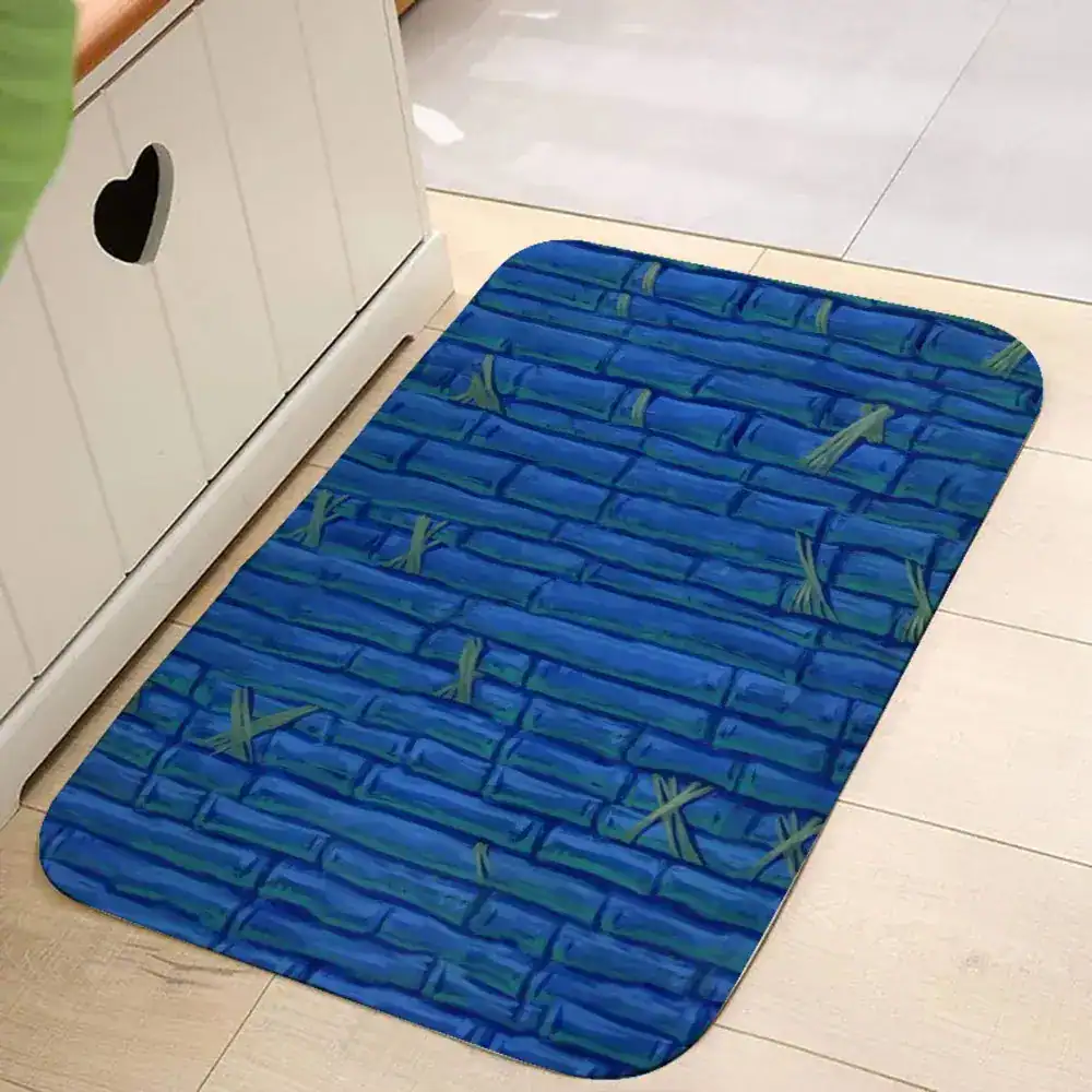 Blauwe bamboe badkamermat met groene bladerenprint, antislip voor bad of douche.