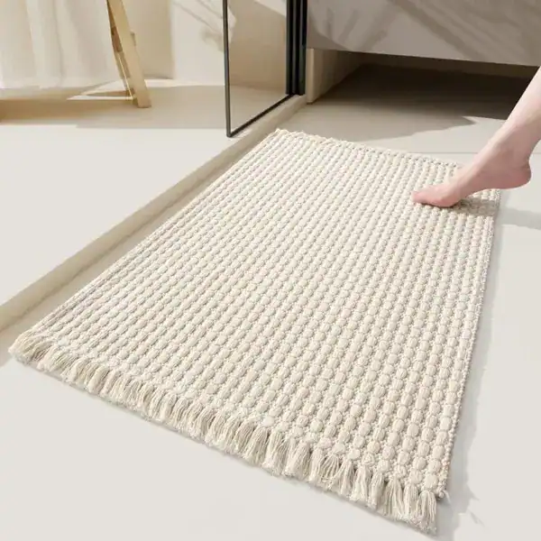Bohemian badmat met franje, antislip badkamermat in crèmekleur.