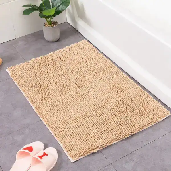 Beige chenille badmat 60x90 voor badkamer, antislip en comfortabel.