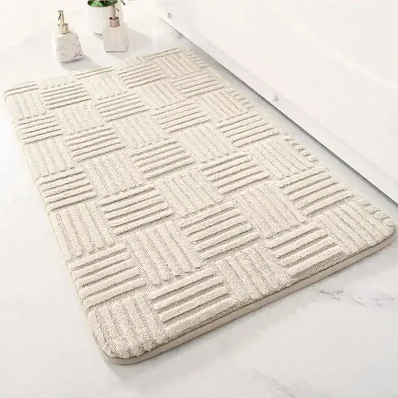 Dikke badmat met gestreepte textuur, antislip, voor badkamer.