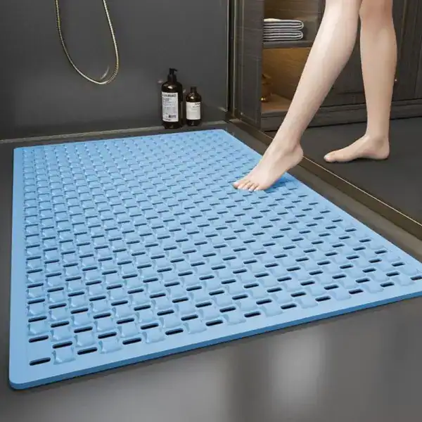 Blauwe douchemat met antislip textuur voor badkamer.
