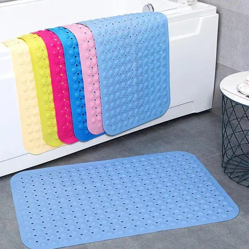 Baddouchemat rubber met antislip textuur in blauw, geel, roze en andere kleuren.