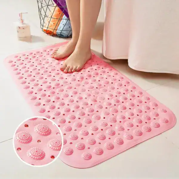 Roze douchemat rubber met antislip textuur voor badkamer.