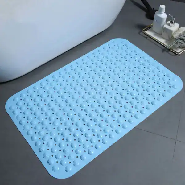 Witte badkamermat met antislip textuur voor veiligheid in de douche.