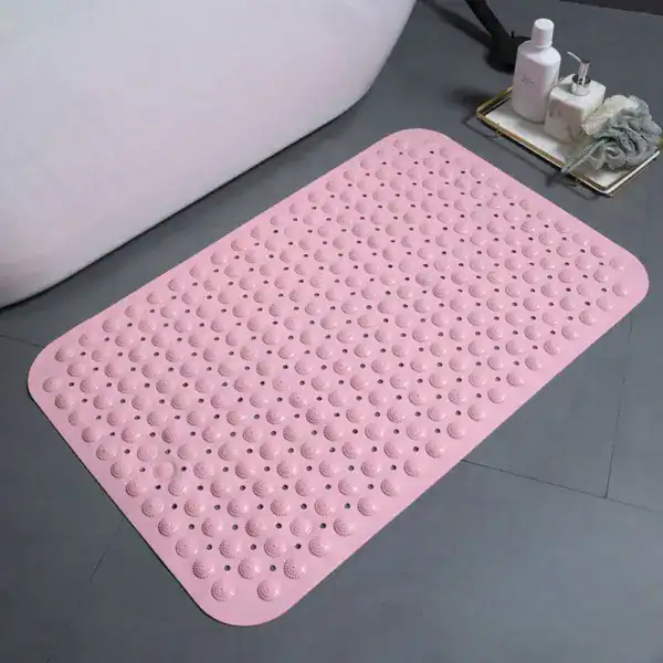 Witte badkamermat met antislip textuur voor veiligheid in de douche.