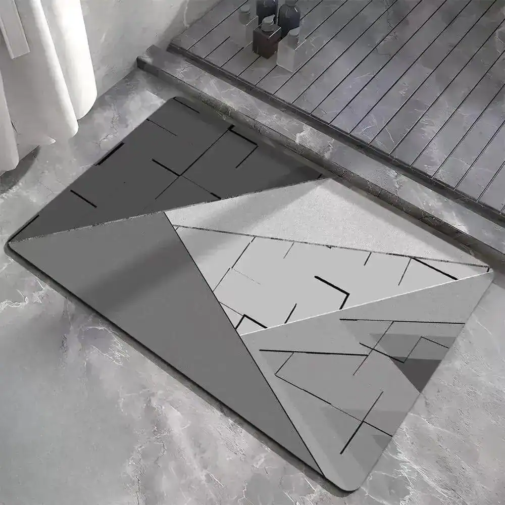 Badmat met geometrisch patroon in grijstinten, antislip voor badkamer.
