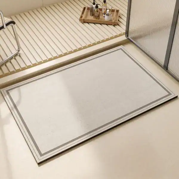 Extra grote badmat met grijze rand, antislip, voor badkamer of douche.