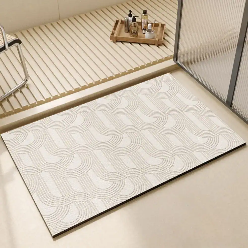 Extra grote badmat met antislip textuur in wit, voor badkamer en douche.