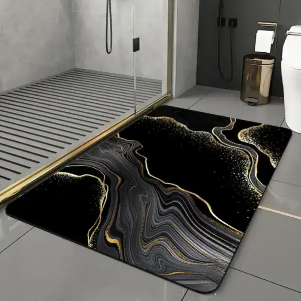 Gouden badmat met zwart marmerpatroon voor badkamer.