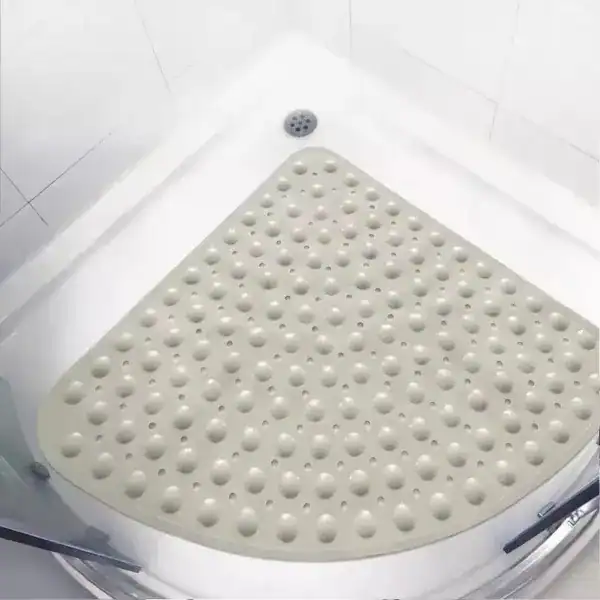 Hoek douchemat met antislip textuur in de douche.