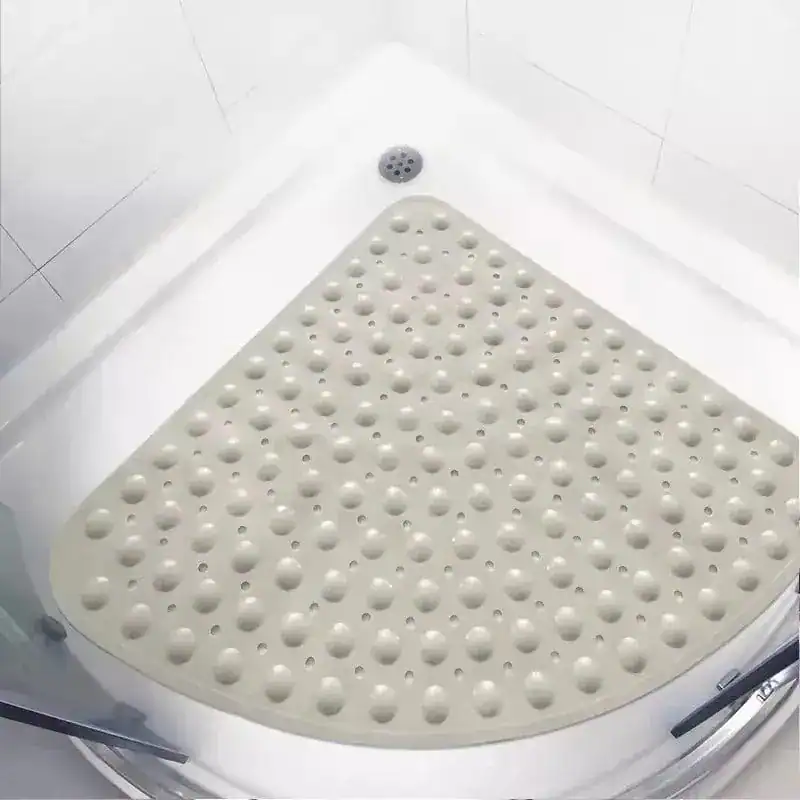 Hoek douchemat met antislip textuur in de douche.
