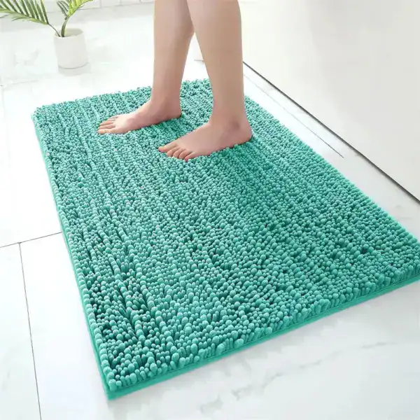 Hoogpolige badmat in turkoois, antislip, voor badkamer en douche.