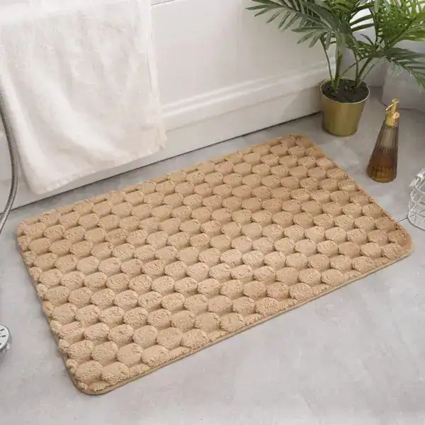 Luxe beige badkamermat met hexagonale textuur, antislip, voor bad of douche.