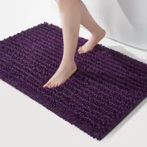 Paarse badmat met antislip textuur, geschikt voor badkamer en douche.