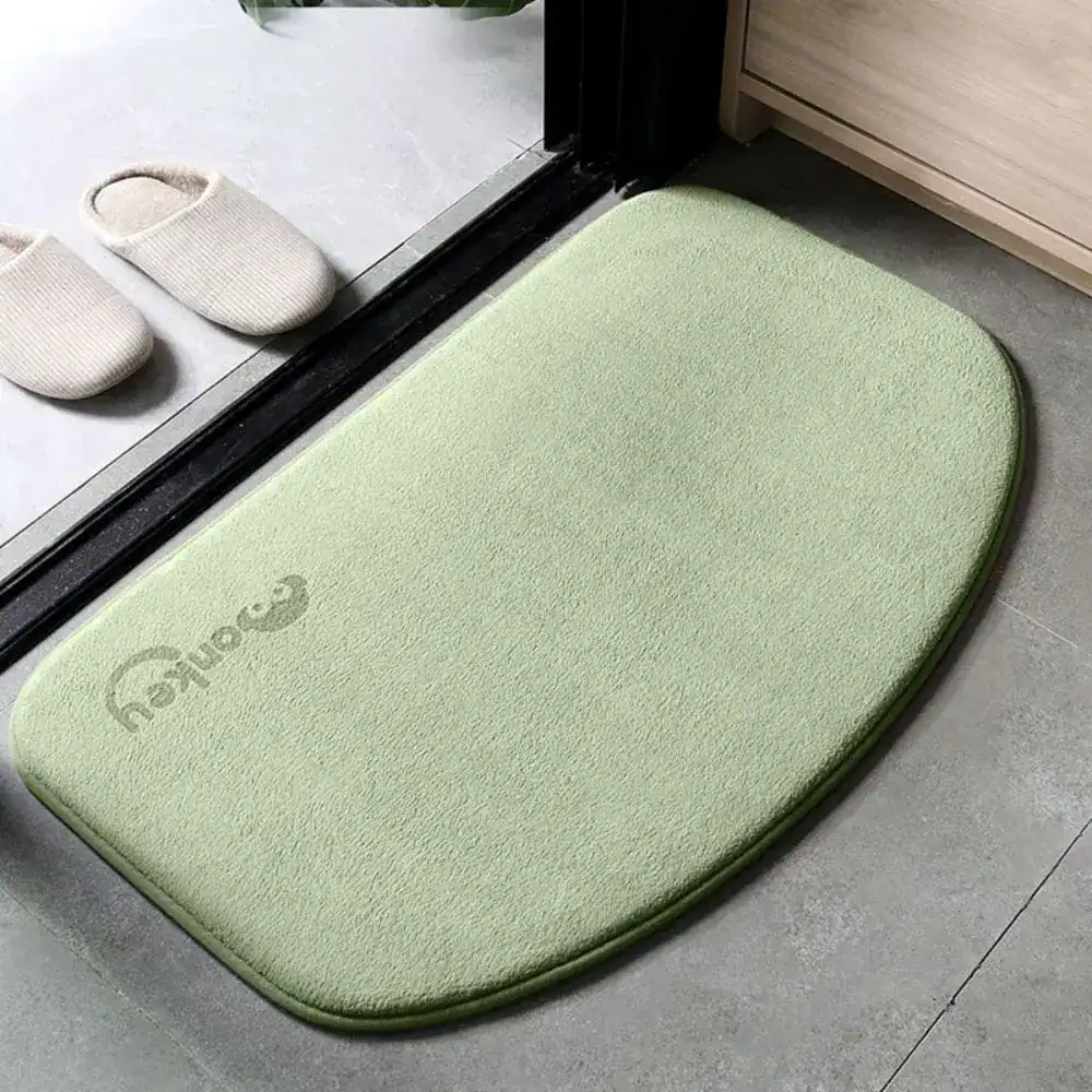 Ronde badmat taupe met antislip rand, voor badkamer of douche.